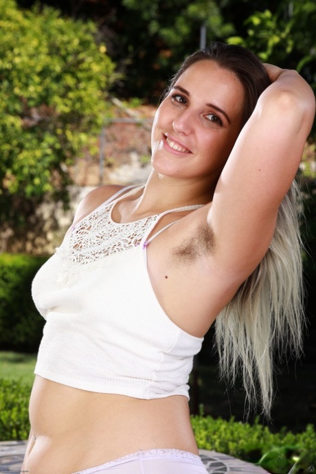 Chubby American babe Dria Submits flaunts her hairy armpits, twat and big ass