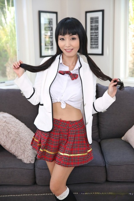 Cute Asian schoolgirl Marica Hase gets fucked doggystyle by Mick Blue