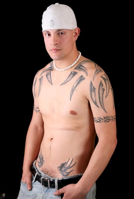 Inked twink Zeph unveiling his tattooed body, fat dick and nice booty