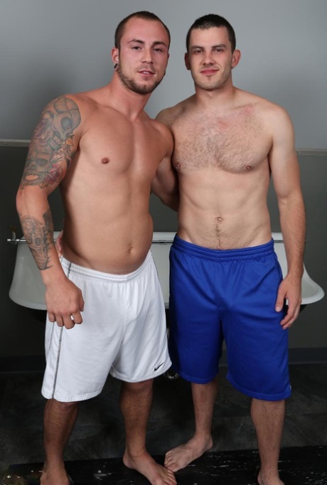 Gay athletes Dusty & Vander meet in a public bathroom and have anal sex