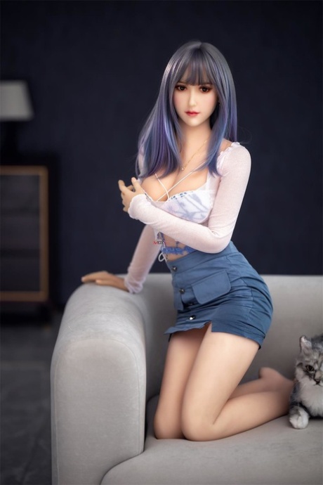 Cute sex doll shows her flawless figure in a sexy outfit & while naked