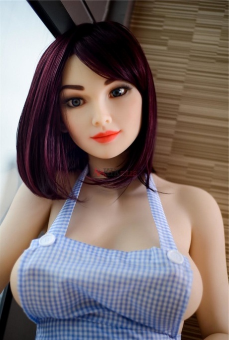 Realistic sex doll Hellen getting naked and posing at the dining table