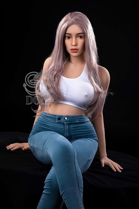 Purple-haired sex doll Xevana teasing with her monster curves in a solo