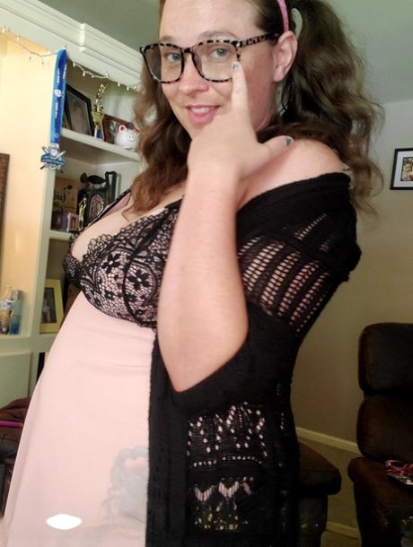 Nerdy amateur in glasses Michella Marijuana teases with her deep cleavage