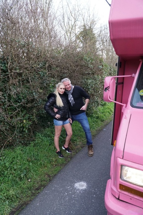 German teen Lena Nitro gets her pussy stuffed by an old guy in a pink van