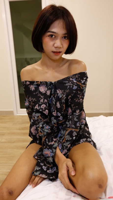 Shy Asian shemale Pon unveils her small tits and blows a dick in POV