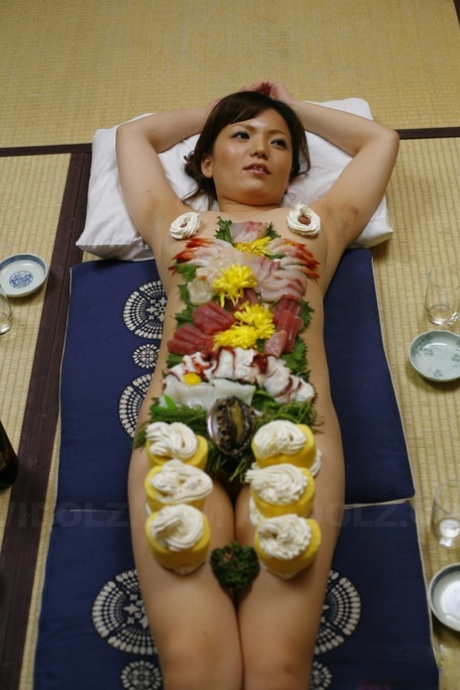 Japanese babe Asuka Ayanami has her body used as a plate for horny men