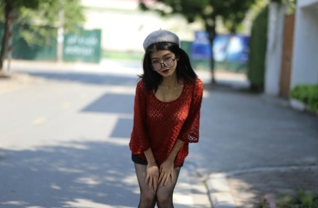 Petite Asian college girl with glasses & hat Irena poses in her lovely outfit