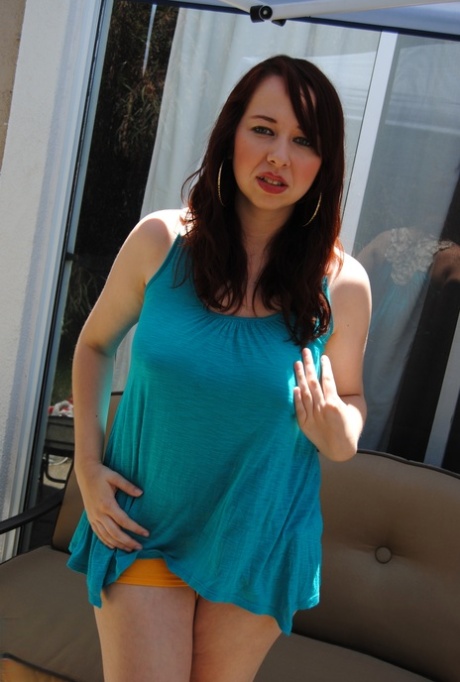 Beautiful amateur fatty posing in her dress, shorts and flip-flops