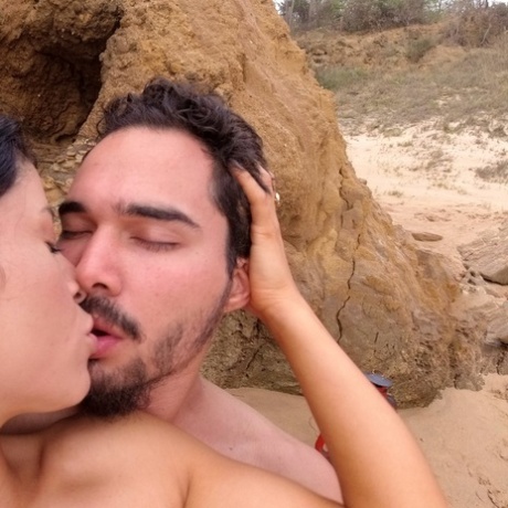 Brunette European gets filmed and fucked by her man on the beach