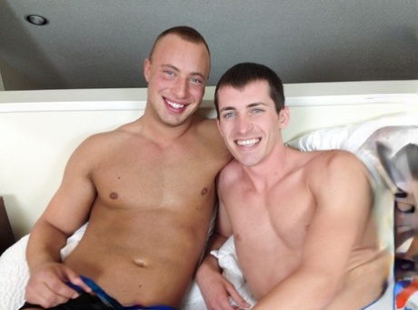 Gay men Dustin Tyler & Shawn Andrews give each other a blowjob & have anal sex