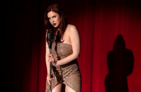 Gorgeous celebrity Maitland Ward does a sexy striptease on stage
