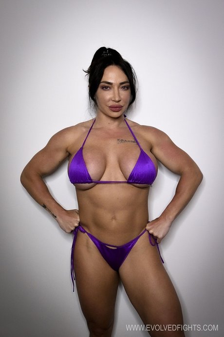 Muscular female wrestler Brandi Mae gets banged by her cruel coach