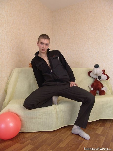 Slim twink Tolik slowly exposes his body and rubs his fat hard dick