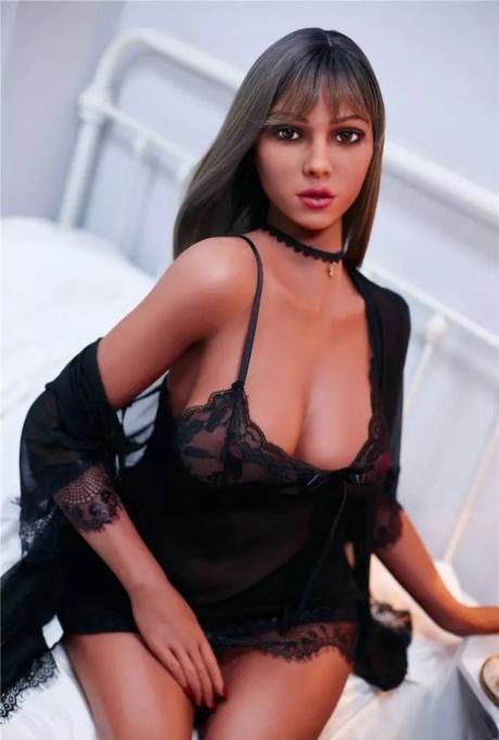 Gorgeous curvy sex doll teases with her big boobs wearing black lingerie