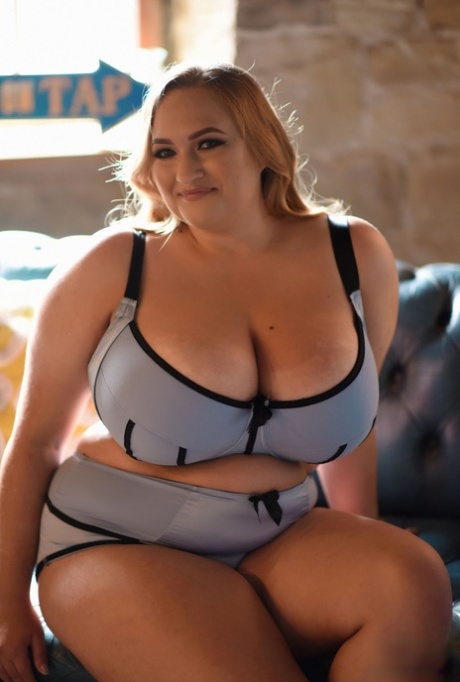 Chubby babe Sara Willis poses in her lingerie and unleashes her huge tits