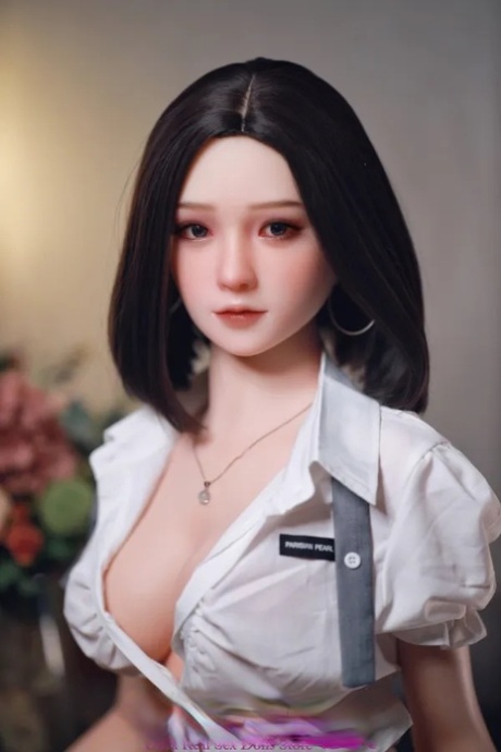 Elegant sex doll Irene poses in her uniform, lingerie and butt naked