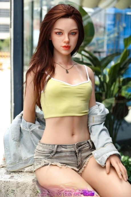 Realistic petite sex doll Hedy flaunts her slim body and warm cunt