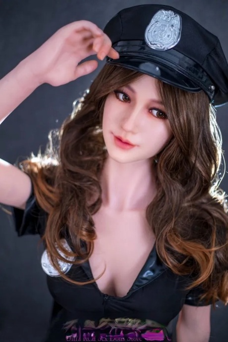 Police officer sex doll posing in her hot outfit and unveiling her boobs