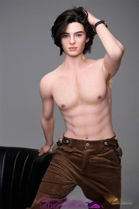 Good-looking young male sex doll shows his fully-erect big dick