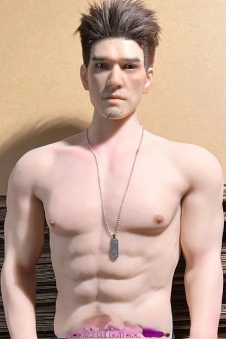 Hunky male sex doll strips completely naked and jerks his big dick