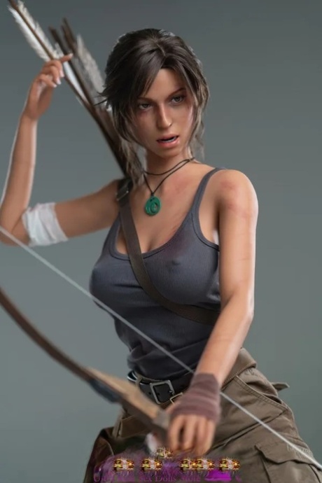 Realistic game character sex doll Lara Croft exposes her figure and big tits