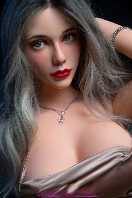 Pretty silicone sex doll Esperanza posing naked and in her elegant dress