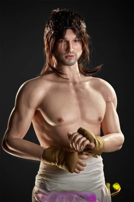 Good-looking male sex doll shows his athletic body wearing a shaolin outfit