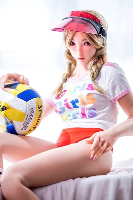 Tiny blonde volleyball player sex doll Pao strips to her socks in a solo