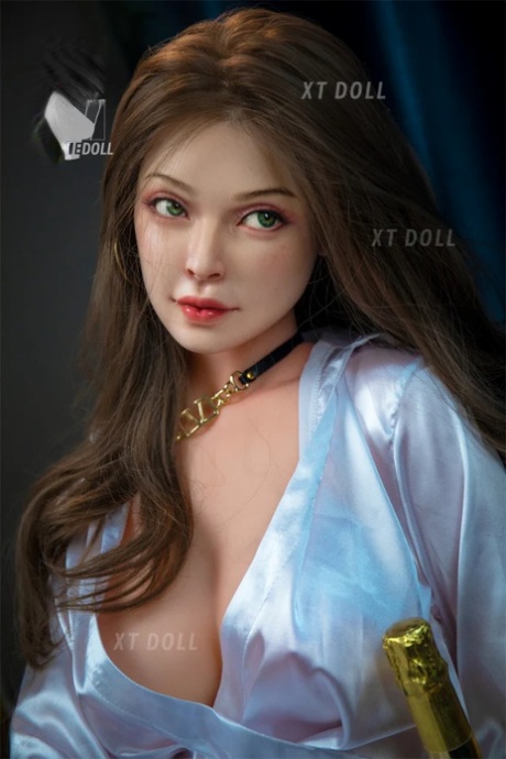 Beautiful silicone sex doll Jennifer loses her nightgown and poses naked