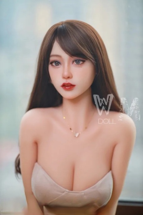 Pretty lifelike sex doll shows off her petite body wearing sexy lingerie