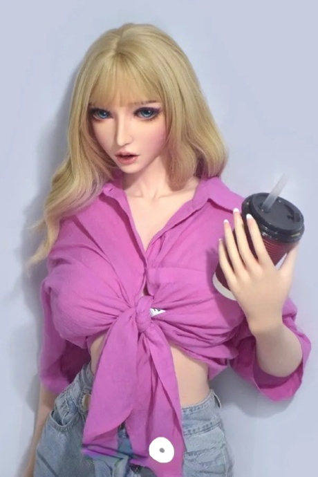 Sexy silicone sex doll Chiba strips off her purple top and shows her big tits