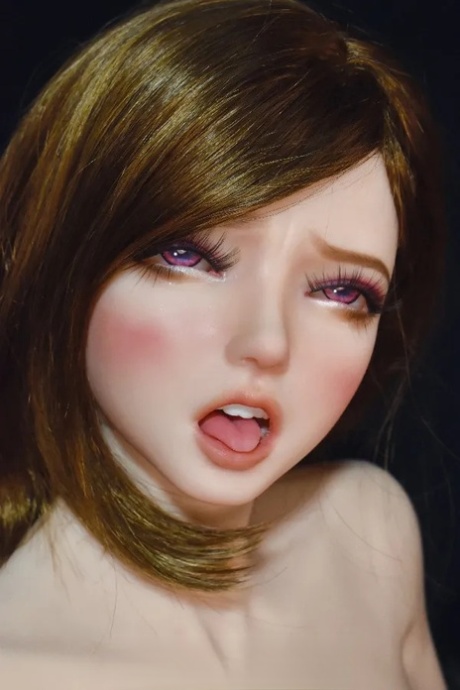 Hot blonde is joined by a sex doll that gets on her knees to her pleasure