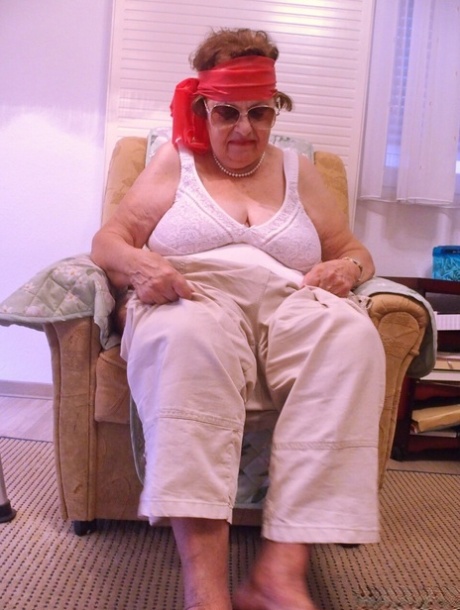 Fat old granny in sunglasses Petljura shows off her body and big tits