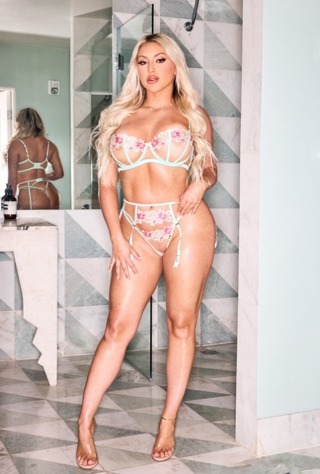 Smoking hot curvy blonde Kayley Gunner exposes her fat ass and gets blacked