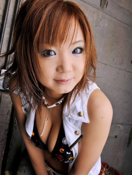 Asian girl Mizuki Ishikawa enjoys a 3some after getting her petite body lubed