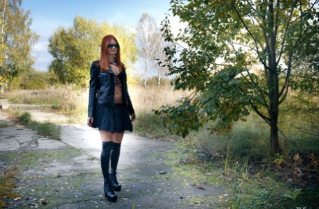 Amateur ginger teen in leather outfit Ginger Z toys herself in the tunnel