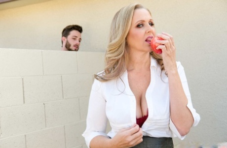 Sexy teacher Julia Ann humps her handsome stud